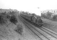 A Whitecraigs - Glasgow train leaving Williamwood on 17 August 1951. The locomotive is McIntosh ex-Caledonian 0-4-4T 55235.<br><br>[G H Robin collection by courtesy of the Mitchell Library, Glasgow 17/08/1951]