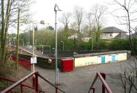 A quiet Sunday morning at Kirkhill in April 2007, seen here looking north west from the station entrance on Greenlees Road. The wide mezzanine level spanning the platforms once housed the booking office [see image 8051].<br><br>[John Furnevel 15/04/2007]