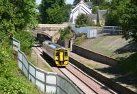 Another driver training run on the Borders Railway on a bright and sunny 9 June 2015. ScotRail 158869 heads south through the site of the 1847 Eskbank station, which eventually closed in 1969. The train will pass through its new 2015 replacement around half a mile further on.<br><br>[John Furnevel 09/06/2015]
