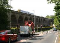Heading for Tweedbank, a 158 on a route familiarisation trip crosses Newbattle Viaduct on 11 June 2015.<br><br>[John Furnevel 11/06/2015]
