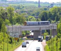 The 1052 Tweedbank - Newcraighall 2Z51 ScotRail 158 driver training trip crossing Hardengreen Viaduct on 11 June 2015 approximately 3 miles from its destination [see image 45688].<br><br>[John Furnevel 11/06/2015]