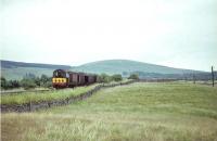 A pair of EE Type 1 diesel locomotives, with D8122 leading, between Abington and Crawford on 29 July 1967 with a long train of empty stock.<br><br>[John Robin 29/07/1967]