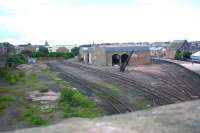 The disused goods yard and shed on the west side of Arbroath station, seen looking north from Keptie Street in August 2006. The buildings have since been demolished [see image 21325].<br><br>[John Furnevel 09/08/2006]