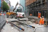 Construction work and tram track laying taking place in Corporation Street near Manchester Victoria station on 25 June 2015 in connection with the planned 'second city crossing'. [See news item]<br><br>[Mark Bartlett 25/06/2015]