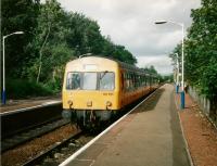 In July 1997 DMU 101691 draws into 'Shaws West with a Barrhead service. Although surviving a few years into the period of SPT carmine and cream livery none of the 101s got the treatment. Pity; I think it would have suited them.<br>
<br><br>[David Panton 17/07/1997]