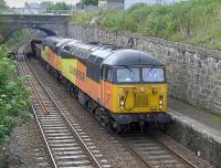 Colas 56113 and 56078 enter Kinghorn station on 4 July 2015 with a Millerhill - Inverness ballast train.<br><br>[Bill Roberton 04/07/2015]