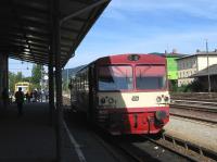 A scene which happens just twice a day at the once-busy Furth im Wald station (close to the German-Czech border). The Czech Railways 09.06 train to Pilsen ( a 1981-vintage railcar) waits for its few passengers on 25th June, while in the background a modern Oberpfalzbahn unit is soon to depart at 09.05 - normally to Schwandorf on the Regensburg-Hof main line, but on this occasion only to Roding due to track works.<br><br>[David Spaven 25/06/2015]