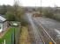 The bottom end of Millerhill Yard looking south past the former station on 12 April 2015. With the new recycling depot on the north west corner of the yard now accessible from the north, the temporary route for construction traffic has been closed and the landscape restored [see image 47809]. <br><br>[John Furnevel 12/04/2015]