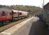 A railtour to Whitby waits at Glaisdale on 13 April 2015 for the Northern Rail service to Middlesbrough to arrive on the single line section from Whitby.<br><br>[John McIntyre 13/04/2015]