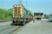 08675 shunting flatbeds carrying steel sections at Stockton Haulage, Stranraer, in 1989.<br><br>[Ewan Crawford //1989]