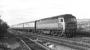 Brush Type 4 No. 1545 has rather beaten the camera as it accelerates off the Royal Border Bridge and past the junction with the Kelso line (still in the process of being dismantled) at Tweedmouth on Saturday 19th September 1970. 1E15 was a dated SO relief to the 10:30 Aberdeen - Kings Cross, departing Edinburgh 15 minutes ahead of it at 13:45, and should have run for the last time a fortnight earlier, but has been reinstated in anticipation of heavy traffic in connection with the Edinburgh Festival.<br><br>[Bill Jamieson 19/09/1970]