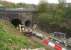 A close up of the north portals of the Farnworth Tunnels on 10 May 2015. At this stage the track has been removed from the left hand tunnel. [See image 51272]<br><br>[John McIntyre 10/05/2015]