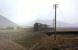 Rebuilt Patriot 45530 <I>Sir Frank Ree</I> with a Crewe - Perth train at Elvanfoot on a hazy 2 April 1965.  <br><br>[John Robin 02/04/1965]