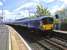 Most 318s are still in SPT carmine and cream but here two saltire-liveried sets have been paired. Seen at Partick on 30 May 2015 with a Milngavie service.<br>
<br><br>[David Panton 30/05/2015]