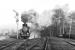 PKP 2-8-2T No. TKt48-111 sets off from Srem with the 07:06 Czempin to Jarocin stopping train on 25th February 1991. The German style signals indicate that the exit from the station is clear but at a restricted speed of 40km/h - it is not showing clear home and distant arms as in British practice.<br><br>[Bill Jamieson 25/02/1991]