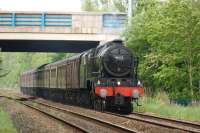 The Railway Touring Company's <I>Cumbrian Mountain Express</I> on 6 June 2015 ran from London to Appleby via Shap and returned via Settle and Blackburn. The 'northern' legs of the tour were hauled by 46115 <I>Scots Guardsman</I>. The train is passing under the M6 motorway as it approaches Bamber Bridge.<br><br>[John McIntyre 06/06/2015]