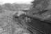 An afternoon Glasgow Queen St to Edinburgh Waverley push-pull service recedes from the camera towards Winchburgh Tunnel having just passed through the junction there behind a pair of class 27s, of which No. 5400 was the leading loco. Thought to have been taken in April 1972.<br><br>[Bill Jamieson 15/03/1972]