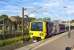 Northern Rail EMU 323230 about to leave Glossop Station on the evening of 20 June bound for Manchester Piccadilly.<br><br>[Peter Todd 20/06/2015]