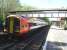 SWT 159106 stands at Sherborne Station shortly after 10.00 on 12 May  with the 09.32 arrival from London Waterloo heading for Exeter St. Davids. This unit started life as TransPennine Express 158809, before the 158s were displaced by the arrival of the class 185 DMUs. <br><br>[David Pesterfield 12/05/2015]