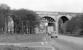 There was no train crossing the westernmost section of the Almond Viaduct over the then A8 trunk road when I photographed it late one afternoon in April 1972, but the vehicle in the foreground heading east towards Edinburgh may be of some interest - a virtually brand new all steel Mini Traveller registration number XSF 781K. (I wonder if it still exists?)<br><br>[Bill Jamieson /04/1972]