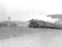 Fairburn 2-6-4T 42126 westbound near Dumbuck, between Bowling and Dumbarton, in the spring of 1958 with a Rutherglen - Balloch train. [Ref query 6947]<br><br>[G H Robin collection by courtesy of the Mitchell Library, Glasgow 12/04/1958]