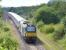 DRS 68002 takes the Niddrie North chord at Niddrie West Junction on 14 July with the empty stock for the Fife Circle service.<br><br>[Bill Roberton 14/07/2015]