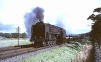 BR Standard class 9F 2-10-0 92130 with an up freight south of Lamington on 26 September 1964.<br><br>[John Robin 26/09/1964]