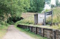 Donyatt Halt was situated just south of Ilminster on the Taunton to Chard line, closed in 1962. The station has been recreated as a feature on the trackbed bridleway. The small figure on the platform is <I>Doreen</I>, who was evacuated here during the war and later wrote about her experiences. <br><br>[Mark Bartlett 25/07/2015]