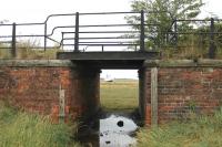 This cattle creep at Conder Green hasn't carried a train since 1964 but, following a rebuild, still performs a useful role in 2015 taking the Glasson Dock cycle path over an access point to the Lune estuary marshes. [Ref query 15049]<br><br>[Mark Bartlett 09/08/2015]