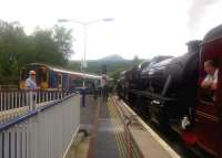 Scene at Crianlarich on 11 August 2015. On the right is 45407 with <I>The Jacobite</I>, diverted due to a landslip at Lochailort.<br><br>[John Yellowlees 11/08/2015]