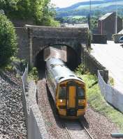 A crew training turn photographed shortly after leaving Galashiels station on the morning of 11 August 2015. The 158 has just cleared Ladhope Tunnel under the A7 on its way north to Newcraighall. [See image 41707]<br><br>[John Furnevel 11/08/2015]