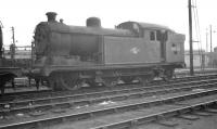 N7 69730 stands in the sidings at Stratford shed on 9 October 1961. The former Great Eastern 0-6-2 tank was officially withdrawn from here that same month and cut up in the nearby works scrapyard shortly thereafter.<br><br>[K A Gray 09/10/1961]