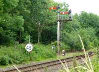 Down home signal at the start of the loop at Girvan in August 2015. Principal signal is for the down platform, subsidiary is for loop into main up platform.<br><br>[Colin Miller 12/08/2015]