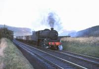 Carstairs based Black 5 no 44956 climbing south towards Crawford Viaduct on 26 June 1964 with a train of mineral wagons.<br><br>[John Robin 26/09/1964]