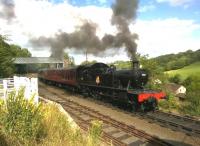 Churchward ex-GWR small Prairie tank 4566 seems to be sending smoke signals as it leaves Highley for Kidderminster in August 2015. Notice the cattle loading pen to the left. For the same engine 36 years previously [see image 41529]. <br><br>[Ken Strachan 26/08/2015]