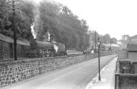 View south along Ladhope Vale, Galashiels, in the mid 1950s. B1 61081 is involved in track maintenance requiring 'wrong line' working on what would eventually become the site of the 2015 station.<br><br>[Bruce McCartney //]