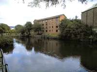 Leith is not normally associated with loco works as the industry here was early and short-lived. The works were here on the south bank of the Water of Leith at Junction Bridge, where these modern flats now stand. Strangely it was not rail-served and locos would have been despatched by wharf. Fife's first locos left from here and crossed the Forth To Pettycur. The works were bought over by Hawthorn of Newcastle in 1846 for construction of 'kit' engines and I've seen it referred to as 'Hawthorn's Yard'.<br><br>[David Panton 05/09/2015]