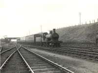 Class D40 4-4-0 no 62276 <I>Andrew Bain</I> brings an Aberdeen train into Fraserburgh on 13 August 1953.  <br><br>[G H Robin collection by courtesy of the Mitchell Library, Glasgow 13/08/1953]