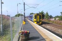 Ahh, the novelty of boarding a train at Newcraighall - and going south. I'm just about to do so as a 4-car 158 pulls in heading for Tweedbank on 8 September 2015, the third day of Borders rail services.<br><br>[David Panton 08/09/2015]