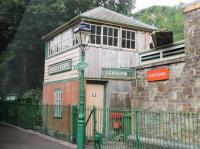 The station at Bere Ferrers, seen from a train on the Gunnislake branch in July 2015. The signal box is part of a small railway heritage centre and was formerly at Pinhoe on the LSWR main line. It carries the name <I>Beer Ferris</I>, which was the station's name until 1897.<br><br>[Mark Bartlett 29/07/2015]