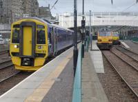 158789 at Platform 7 with the 09.11 to Tweedbank.  Sleeper loco 92032 and Thunderbird 67003 re in the bays.<br><br>[Bill Roberton 13/09/2015]