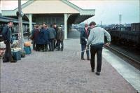 Aviemore station in the 1960s looking north. The group are possibly changing trains to go to Nethybridge. St Andrews, Turnberry or Gleneagles might have been more appropriate.<br><br>[James Crawford //]