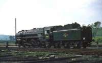 Britannia Pacific no 70013 <I>Oliver Cromwell</I> at Hellifield on 1 June 1968 after arriving with the BR (Scottish Region) <I>Grand Rail Tour no 5</I> from Guide Bridge.<br><br>[John Robin 01/06/1968]