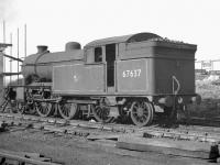 Gresley V1 2-6-2T no 67637 stored alongside Heaton shed awaiting disposal in in early 1963. The locomotive was cut up at Darlington works in April the following year.<br><br>[K A Gray //1963]
