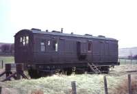 A modified ex-GSWR 6-wheel luggage brake van standing on the stub of the Wanlockhead branch at Elvanfoot in January 1967, some 28 years after closure of the branch. [Ref query 4644] <br><br>[John Robin 02/01/1967]