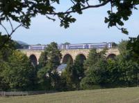 A pair of 158s forming the 14.45 from Tweedbank to Edinburgh cross the Newbattle / Lothian Viaduct.<br><br>[Bill Roberton 27/09/2015]