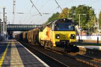 Leyland - Colas Railfreight have again started using Class 70 locos for the Carlisle to Chirk log trains. On 02 October 2015, the third day of running, 70805 heads south at Leyland in the afternoon sunshine.<br><br>[John McIntyre 02/10/2015]