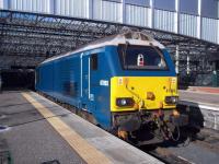 A very clean Caledonian Sleeper locomotive 67003 basks in the September sunshine at the east end of Waverley.<br><br>[Andrew Wilson 24/09/2015]