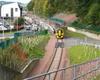 Leaving its penultimate stop at Galashiels on 9 October and about to pass below Station Brae is the 1054 Edinburgh Waverley - Tweedbank.<br><br>[John Furnevel 09/10/2015]