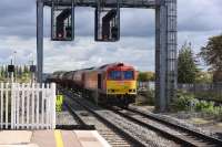 Framed by  substantial signal gantry, DBS <I>Super 60</I> 60054 heads west through Didcot with the Murco tanks on 8th October 2015. This train runs from Theale in Berkshire to Robeston in South Wales.<br><br>[Peter Todd 08/10/2015]